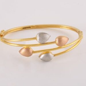 Stylish gold bangle featuring a unique leaf design in silver and rose gold accents.